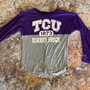 TCU college shirt.